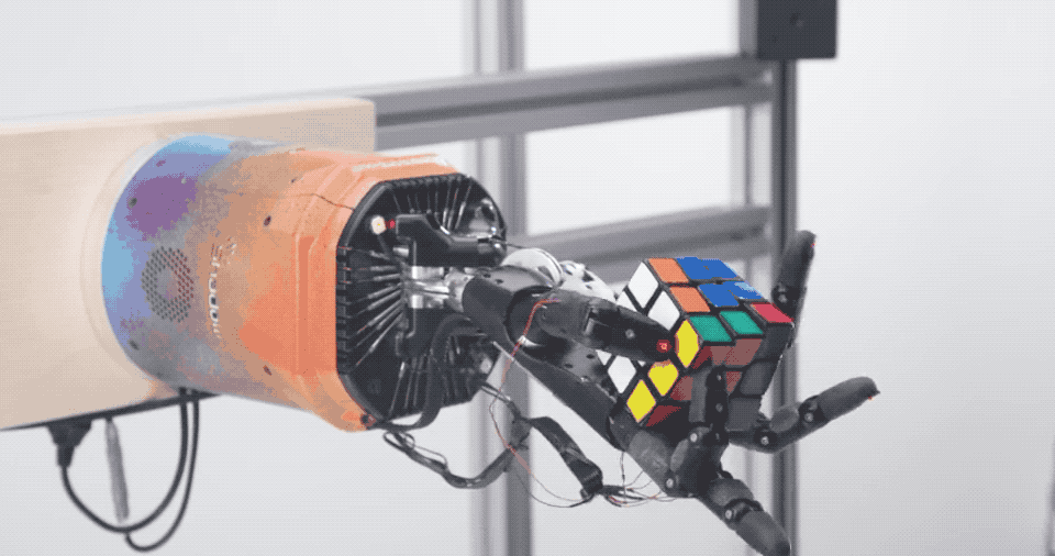 OpenAI robotic hand solving a Rubik's Cube. Image: OpenAI